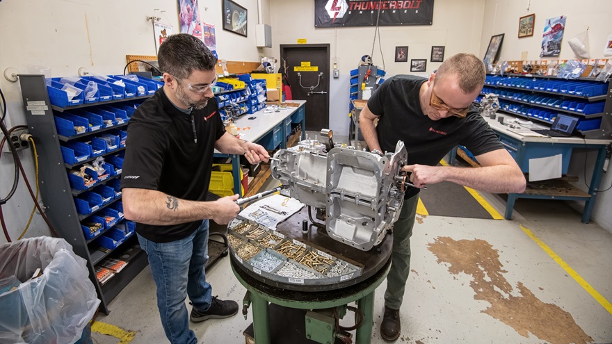 Lycoming Thunderbolt engine builders Zach Earp, right, and Paul Zener at work in 2020. Piston airplane sales held strong through the pandemic, and account for much of the good news in the latest report from the General Aviation Manufacturers Association. Photo by Mike Collins.